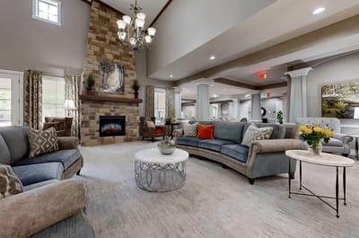 Cozy common area with seating and fireplace.