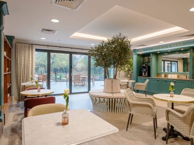 Interior common area with seating and outdoor view