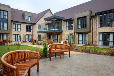 Courtyard with benches and landscaped garden