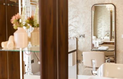 Hair salon area with modern decor and flowers