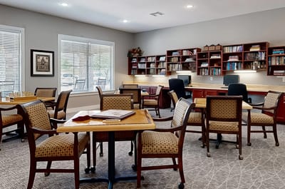 Common area with seating and bookshelves
