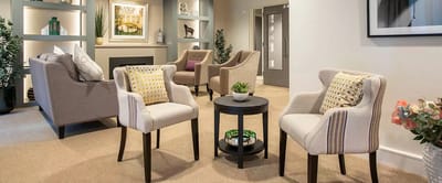 Cozy common area with seating and decor.