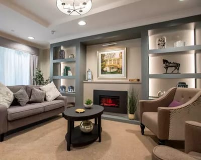 Cozy common area with seating and artwork