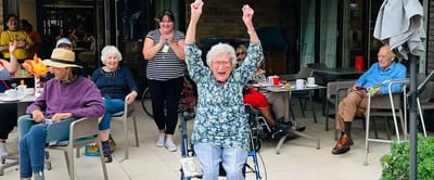 Residents celebrating in an outdoor area