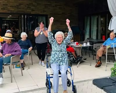 Residents celebrating and enjoying an outdoor activity.