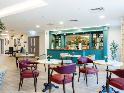 Bright and inviting common area with seating.