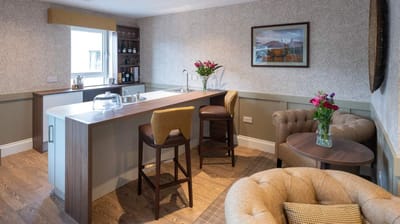 Modern kitchen area with flowers and decor