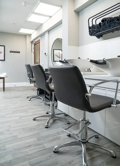 Interior of a hair salon with styling chairs
