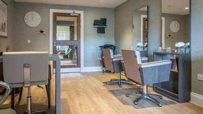 Modern interior space with salon chairs