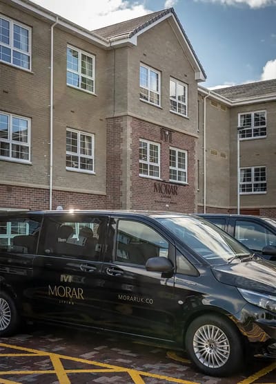 Exterior view of the Morar Living facility with van