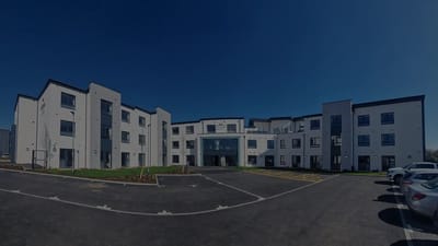 Exterior view of a modern assisted living facility.