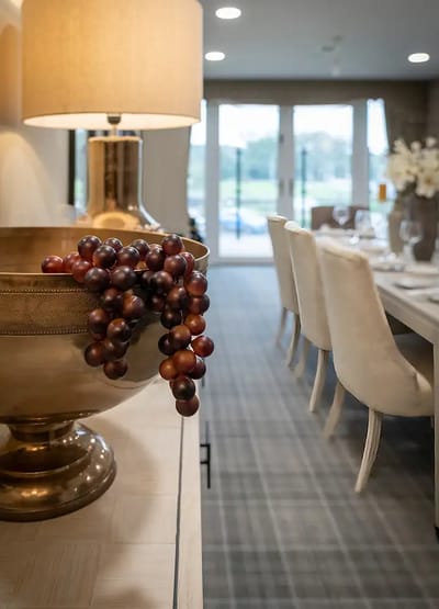 Elegant dining room setting with decor elements.