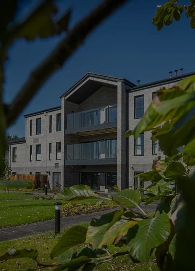 Exterior view of a modern assisted living facility.