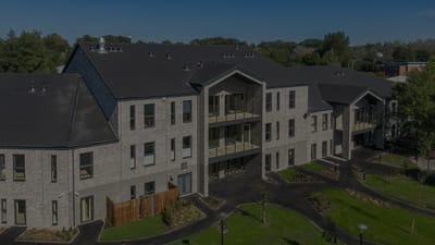 Exterior view of a modern assisted living facility.