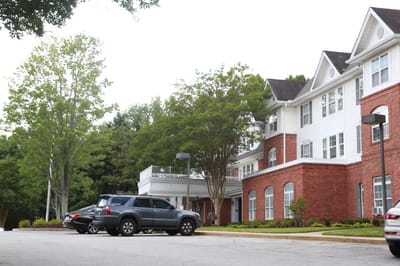 Exterior view of the assisted living facility with parking
