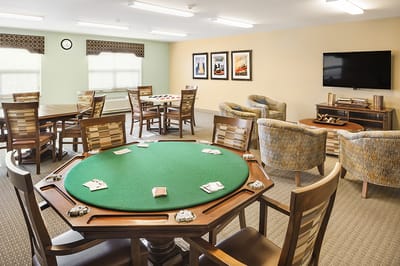 Common area with card tables and seating
