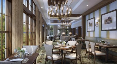 Elegant dining area with tables and chandeliers.