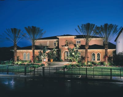 The exterior of a well-lit facility at night