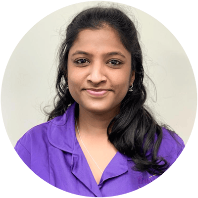 Staff member in purple uniform at TrueArk Healthcare