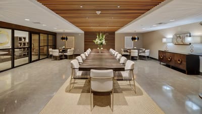 Elegant dining room with modern furnishings.