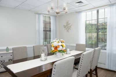Dining area with flowers and modern decor