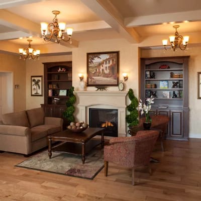 Cozy common area with seating and fireplace.