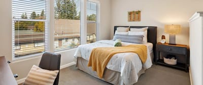 Well-decorated private resident room with natural light