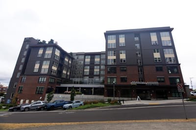 Exterior view of Merrill Gardens at Wright Park building