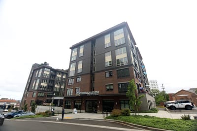 Exterior view of Merrill Gardens building with entrance