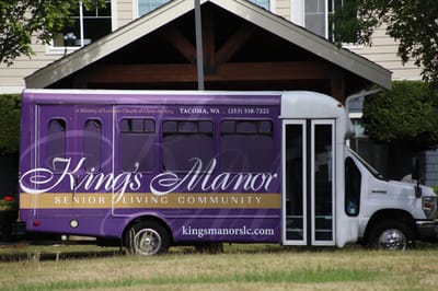 Facility shuttle bus parked outside