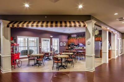 Bright dining area with tables and chairs