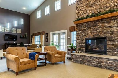 Cozy common area with seating and fireplace