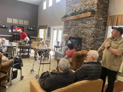 Residents and staff interacting in a common area