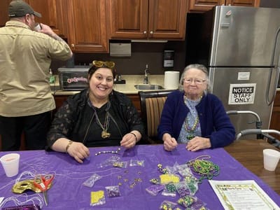 Residents enjoying a bead activity together