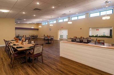 Dining room with tables and chairs set up
