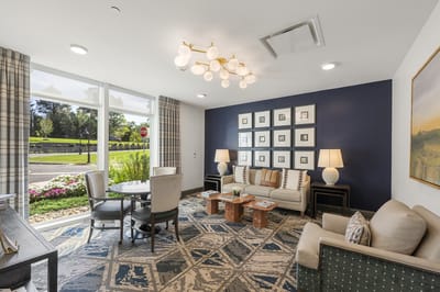 Bright interior common area with seating and decor