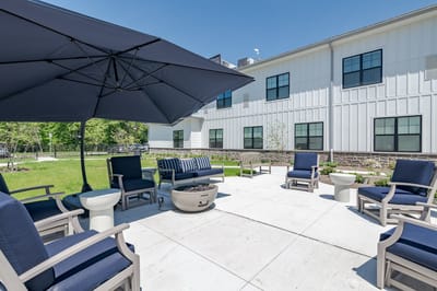 Outdoor seating area with shaded umbrellas