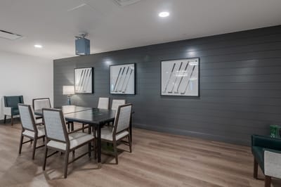 Interior common area with tables and chairs