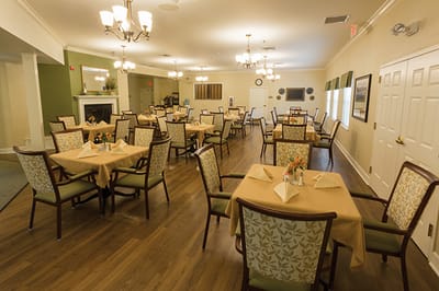 Dining area with tables and chairs set up