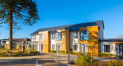 Exterior view of a modern assisted living facility