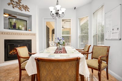 Interior dining area with a table and chairs