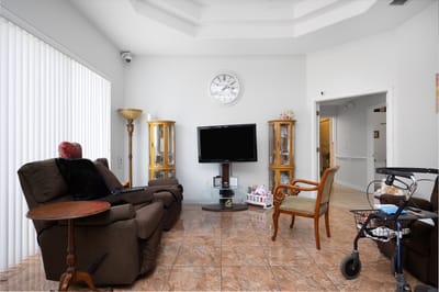 Cozy common area with seating and a television