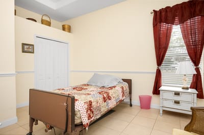 Cozy resident room with a bed and window