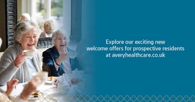 Residents enjoying tea in a bright setting