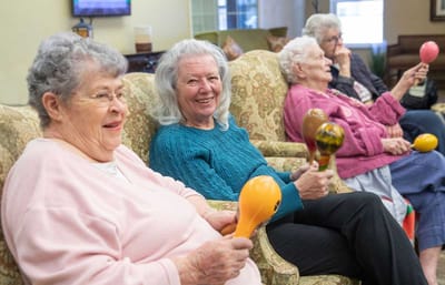 Residents participating in a music activity