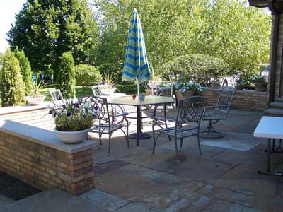 Outdoor seating area with tables and chairs