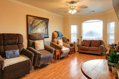 Bright common area with seating and artwork