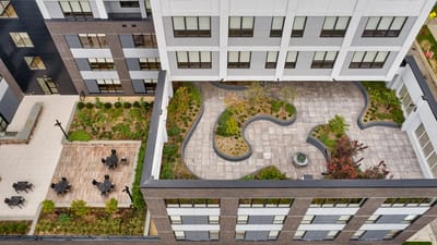 Aerial view of landscaped outdoor spaces at the facility