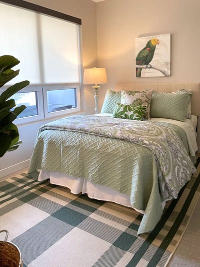 A cozy resident room with a bed and decor