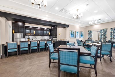 Bright dining area with modern furnishings and decor